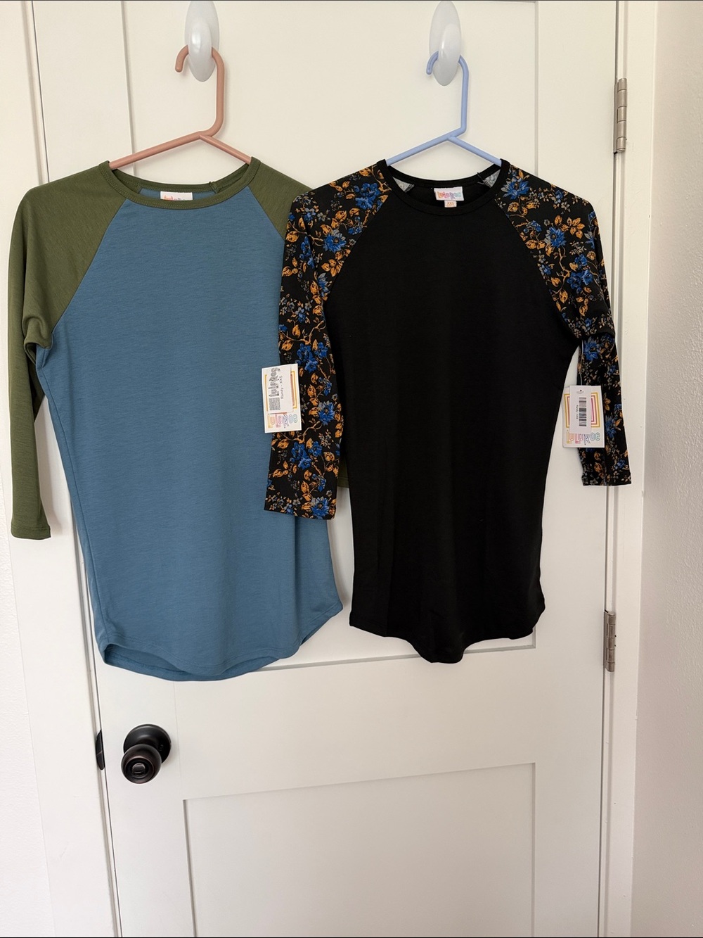 LuLaRoe women’s Randy Tops in Black Floral and Blue with Olive Sleeves
